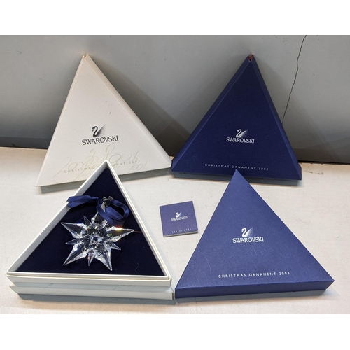 337 - Four boxed Swarovski Christmas ornaments, 2001,2001, 2002 and 2003
Location:5:2