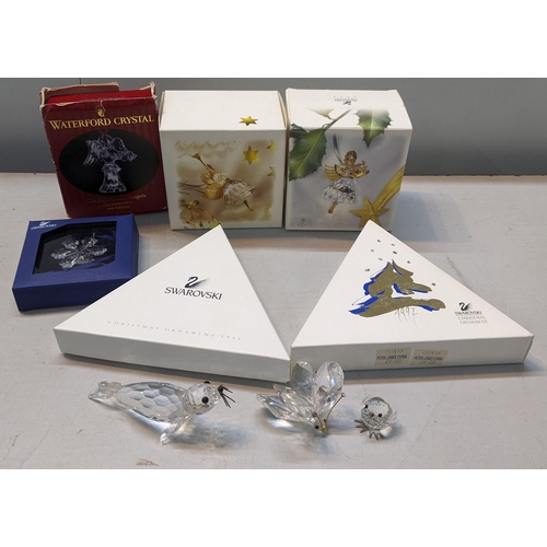 340 - Boxed and loose Swarovski Christmas ornaments to include 1997 and 1998  and others together with a b... 