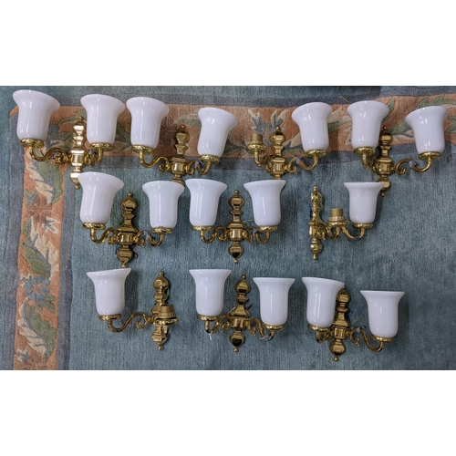 357 - A group of mixed contemporary wall and ceiling brass lights to include a group of ten double arm wal... 