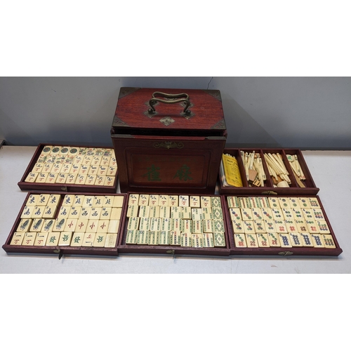 359 - A mid century Mahjong set in a box with five graduated drawers and applied metal mounts
Location:A1F