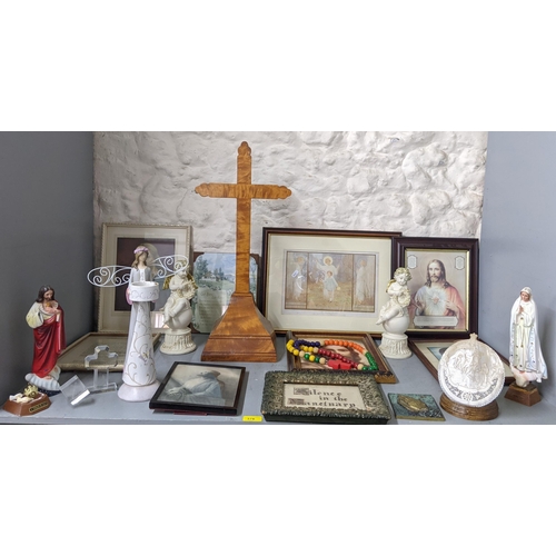 376 - A collection of Christian and related items to include a walnut veneered cross framed and glazed, pi... 