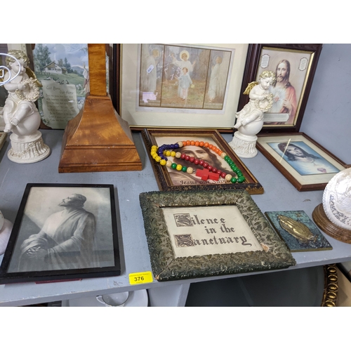 376 - A collection of Christian and related items to include a walnut veneered cross framed and glazed, pi... 