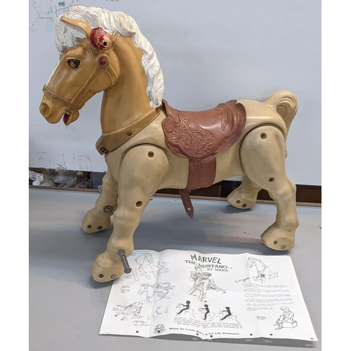 382 - A Max Marvel The Mustang 1960s ride on horse with original instructions
Location:A1M