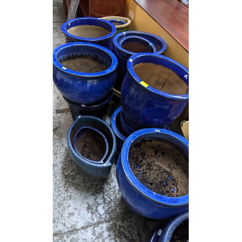 417 - A selection of mainly blue glazed plant pots of various sizes
Location: G