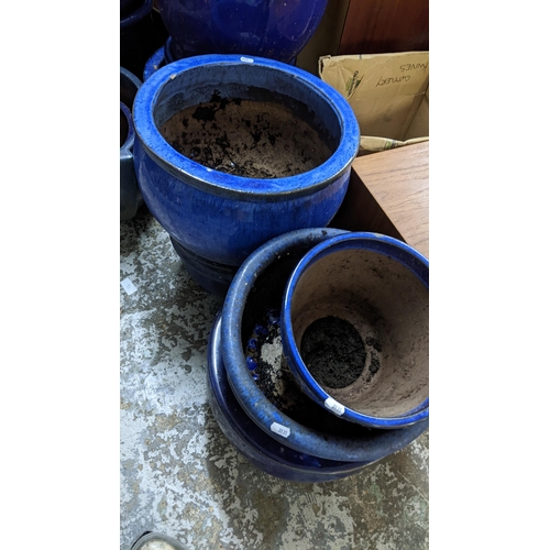 417 - A selection of mainly blue glazed plant pots of various sizes
Location: G