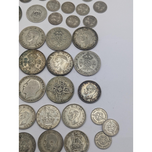 58 - Mixed British coinage to include Edward VII and George V pre 1920 three pence's and shillings along ... 