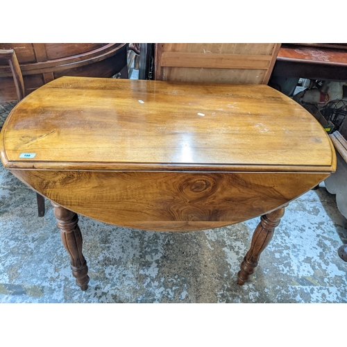 408 - Late 19th century walnut drop leaf D-end table on turned legs 72cm x 110cm x 62cm (when unextended) ... 