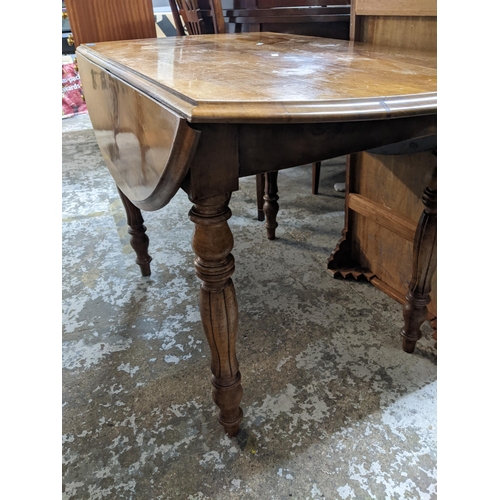 408 - Late 19th century walnut drop leaf D-end table on turned legs 72cm x 110cm x 62cm (when unextended) ... 