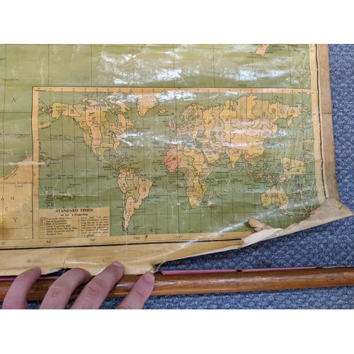 128 - Two maps to include Philips Mercantile Maps of the World and modern double sided map of Africa showi... 