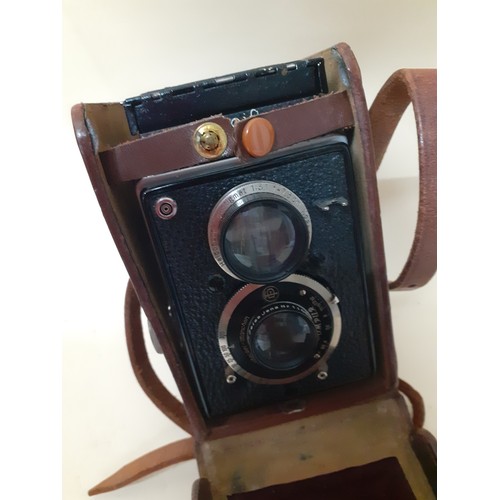 98 - A Rollieflex Compur camera in a brown leather case
Location: RWM