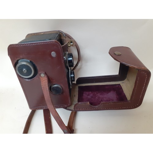 98 - A Rollieflex Compur camera in a brown leather case
Location: RWM