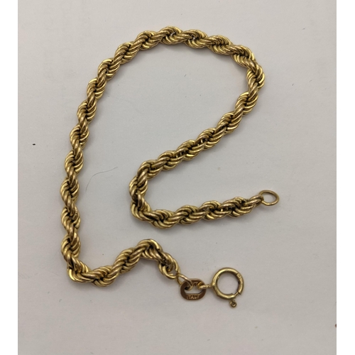 18 - Four 9ct gold bracelets to include two rope twists and a yellow metal enamelled pendant depicting tw... 