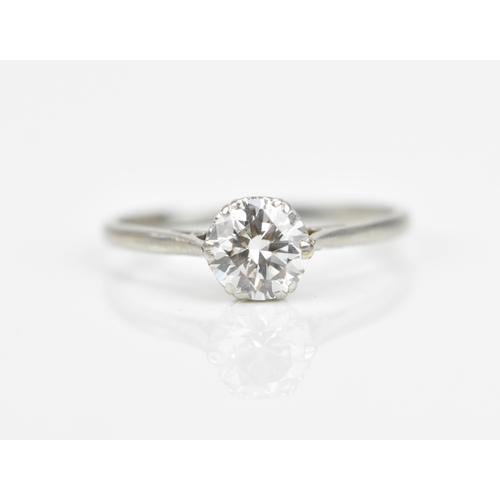 A platinum set diamond solitaire ring, the brilliant cut stone approx 1 ...