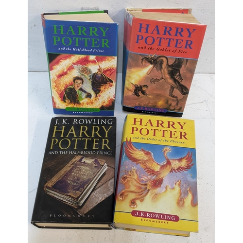 27 - A set of four Harry Potter J.K Rowling first edition  original Bloomsbury hardback books
Location: 1... 