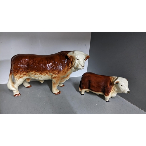 33 - Two porcelain models of cows, Location: 9.1