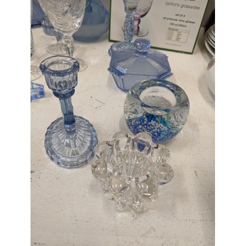 335 - Glassware to include blue glass dressing table items, a figural centre piece, glasses, decanter and ... 