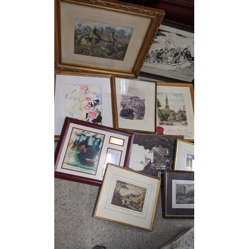 34 - A selection of framed pictures to include a watercolour depicting a cottage, a Geoffrey Lanham water... 