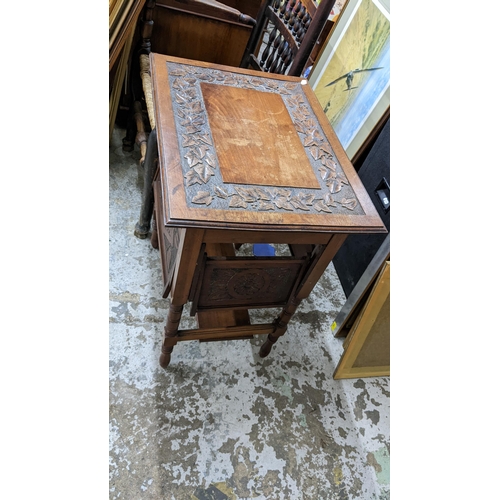 55 - A Victorian walnut occasional tea table with carved flaps, 72h x 61w, Location: G