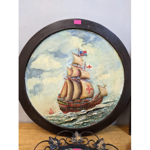 81 - A mixed lot to include a painted relief wall plaque depicting a galleon in wooden frame, a print of ... 