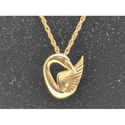 1 - A 9ct gold necklace with a 9ct gold pendant in the form of a swan, total weight 6.6g
Location: CAB2