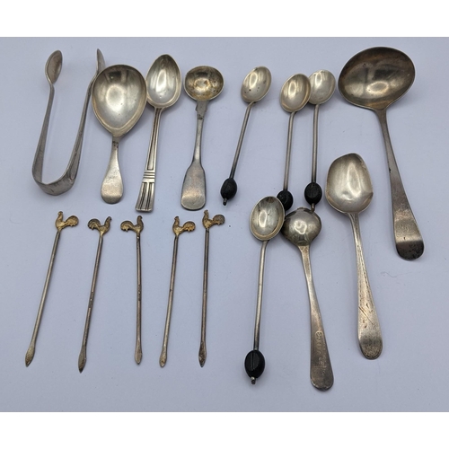 267 - Silver to include a caddy spoon, tea spoons, a sauce ladle, sugar tongs, cocktail sticks and other s... 