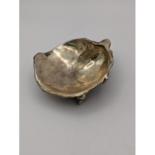 269 - A mid 20th century silver oyster shell design silver salt, by William Comyns & Sons Ltd, 105.5g
Loca... 