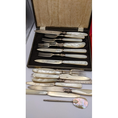 284 - A selection of silver and white metal cutlery to include a set of five enamelled coffee spoons
Locat... 