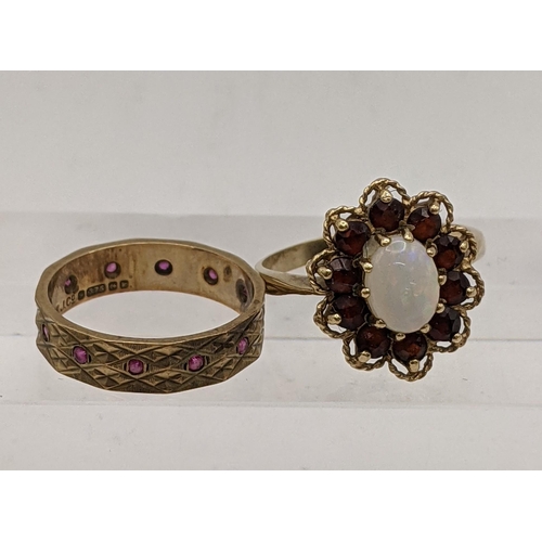 40 - A 9ct gold ring inset with an oval opal and garnets, total weight 3.8g, together with a 9ct gold rin... 