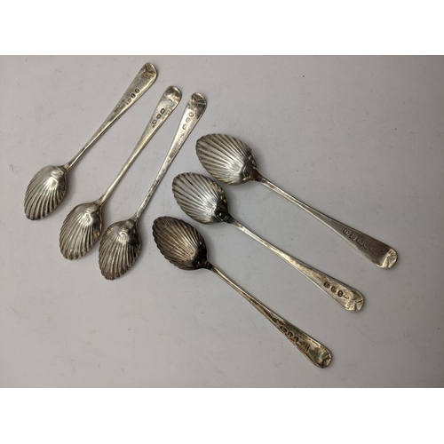 55 - A set of six Georgian tea spoons with scallop design bowls, cased, 66.9g
Location: BWR