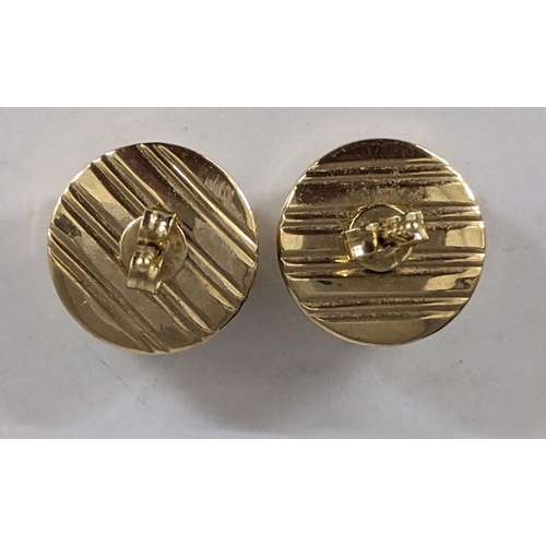 71 - A pair of 9ct gold earrings with an abstract design on the circular face, 1.8g
Location: CAB8