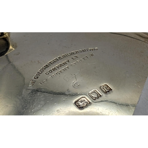 72 - A 1920 silver mustard and sugar pot on three horse hoof feet, makers marks for The Goldsmiths & Silv... 