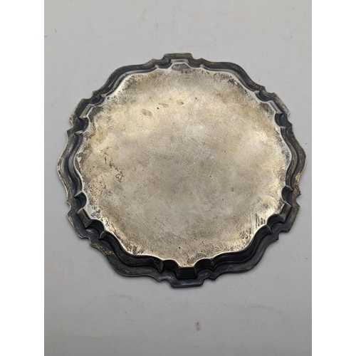 79 - An early 20th century silver card tray, 15.7cm diameter, 111.7g
Location: BWR