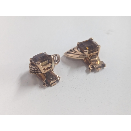 83 - A pair of stamped 18 gold, Art Deco inspired earrings inset with central citrinin, 11.1g, total weig... 