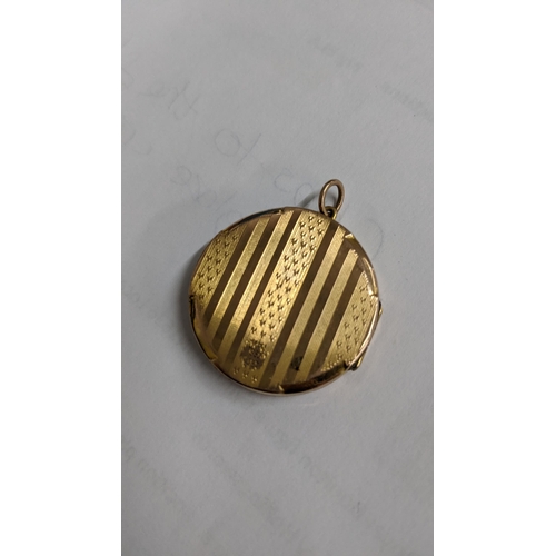 97 - A yellow metal imperial state crown pendant on a 9ct gold necklace 8.4g, together with a gold plated... 