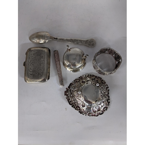 92 - Silver items to include a napkin rings, a salt dish, an elaborately pierced and decorated trinket di... 