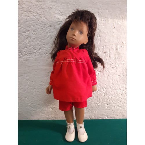 31 - Sasha-A 1970's Trendon doll created by Sasha Morgenthaler having long brunette hair, a red smock dre... 