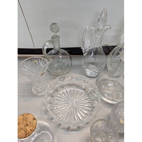 519 - Mixed glassware to include Whitefriars crystal cut decanters and others, along with Whitefriars glas... 