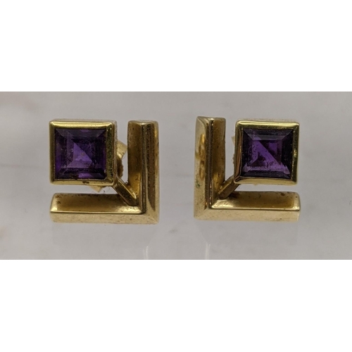 102 - A pair of 18ct gold earring inset with square cut amethysts, total weight 4.6g
Location: CAB1