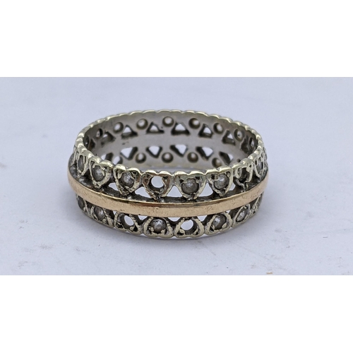 116 - A 9ct gold eternity band inset with paste stones
Location:CAB3