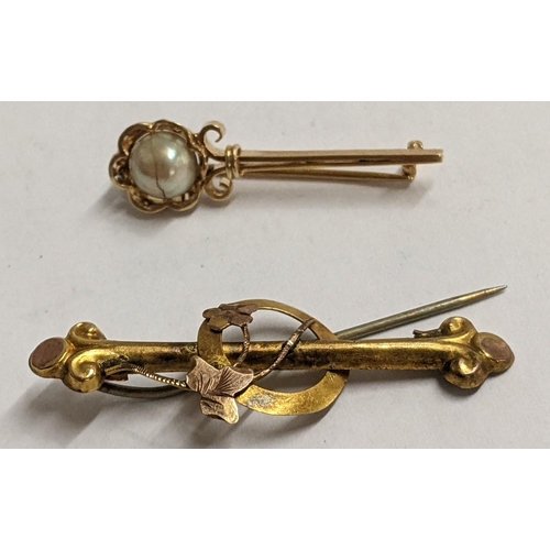 117 - A 9ct gold bar brooch 0.9g together with a yellow metal stick pin brooch  A/F 1.5g
Location: CAB1