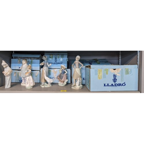 167 - Six Lladro figures to include a girl holding a chicken, a girl holding a basket of oranges, a boy in... 