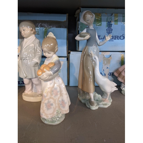 167 - Six Lladro figures to include a girl holding a chicken, a girl holding a basket of oranges, a boy in... 