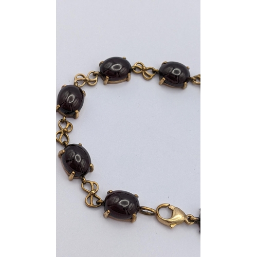 191 - A 9ct gold bracelet having nine oval cut garnets in claw shaped settings, 14.2g
Location: CAB1