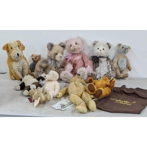 122 - A collection of Bears to include two Charlie Bears, a 1930s bear, a vintage growler bear and others
... 