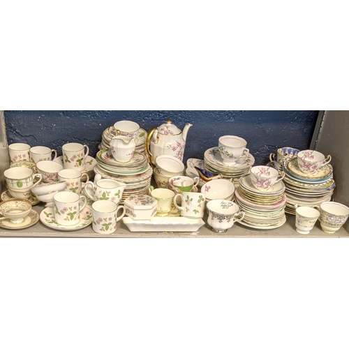 126 - A mixed lot to include Royal Crown Derby paperweight along with Wedgwood cups and saucers in wild st... 