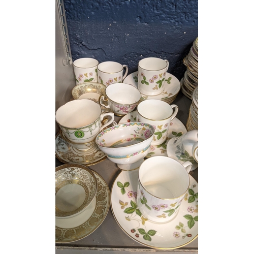 126 - A mixed lot to include Royal Crown Derby paperweight along with Wedgwood cups and saucers in wild st... 