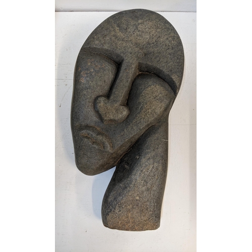 158 - A carved stone sculpture of a head, unsigned 
Location:G