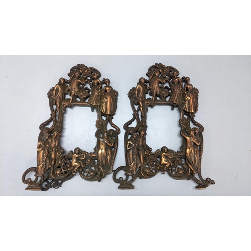 178 - A pair of Victorian wrought iron photograph frames ornately decorated with figures and cherubs
Locat... 