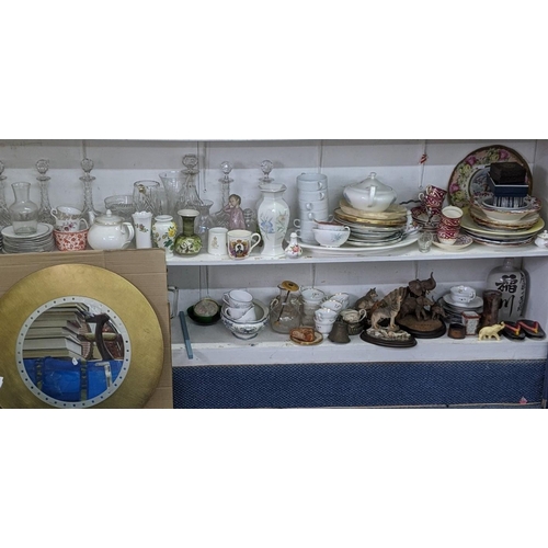 193 - A large mixed lot to include glass decanters, mixed ceramics, Royal Crown Derby, mixed models and ot... 