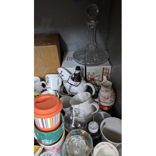 195 - A mixed lot to include various mug including Wallace and Gromit character and others together with m... 